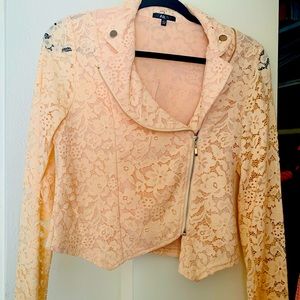 Long sleeve coral color jacket.